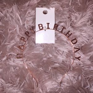 A rose gold “Happy Birthday” headband